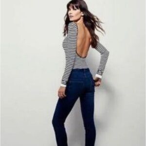 Free People Distressed Skinny Blue Denim Jeans.